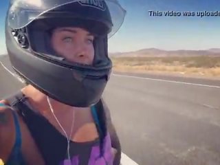 Felicity feline motorcycle beauty riding aprilia in bra