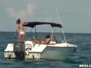 Naughty girls hot to trot threesome on a boat