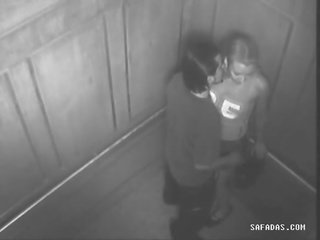 Couple have adult video in elevator forgot there is a camera