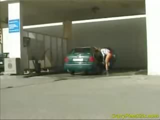 Crazy pee girlfriend at the car wash