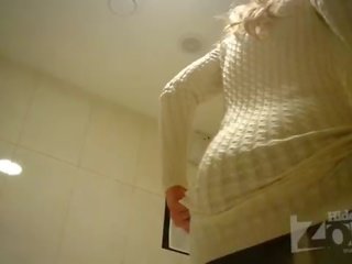 Pleasant blonde in toilet shaved pussy and anus closeups.