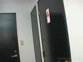 Asian Teen stunner movs Twat While Pissing In A Toilet