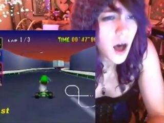 Geek daughter cums playing Mario Kart